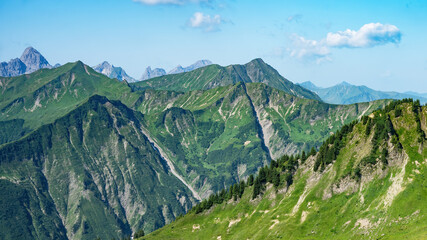 Kleinwalsertal mountains landscape panorama background - Mountain panorama in summer with blue sky and clouds