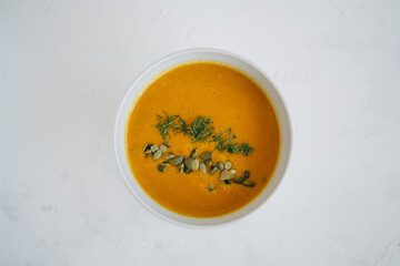Pumpkin soup at white background