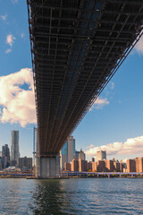 A photograph of a bridge in New York City taken during the day from the Circle Line Cruise