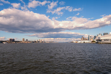 A photograph of the Manhattan skyline taken during the day from the Circle Line Cruise boat.