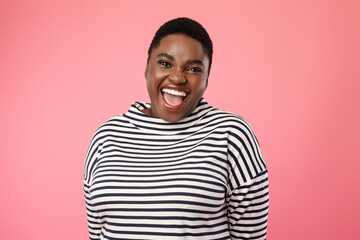 Overweight African American Female Smiling To Camera Over Pink Background