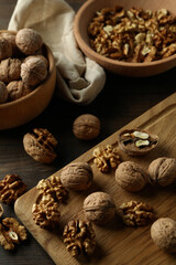 Concept of healthy food with walnuts on wooden background