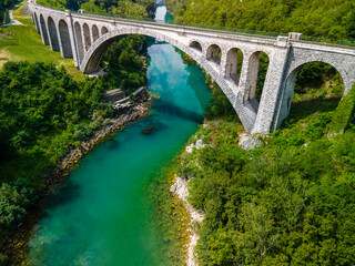 Fototapeta na wymiar Solkan Bridge in Slovenia over River Soca. World Largest Stone Rail Bridge