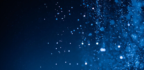 Abstract blue bokeh defocus glitter blur background.