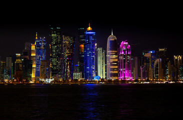 Fototapeta premium background image of qatar's capital city landmark during sunset.