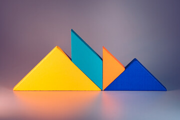 Closeup tangram puzzle use for education and creative concept