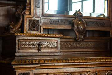 Fototapeta premium wooden antique secretaire or bureau in a house - retro furniture interior