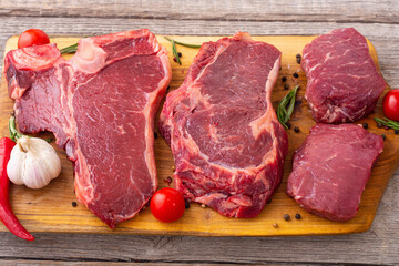 Assortment of beef steak . T-bone , ribeye and fillet mignon