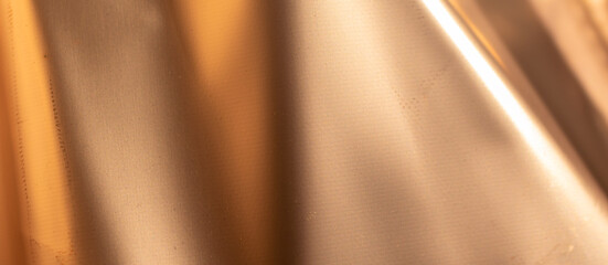 steel sheet painted with golden paint. background or textura