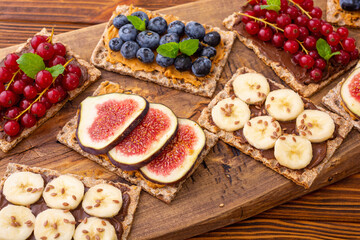 Crispbread with banana  blueberry redcurrant and figs