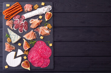 Board with meat, sausages and cheese