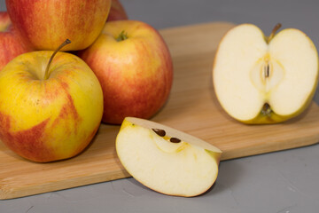 Fresh sliced apple on a wooden desk