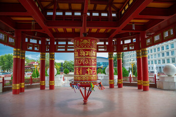 Prayer drum with mantra inside the Seven Days Pagoda. Elista, Kalmykia
