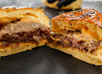 a hamburger cut in half