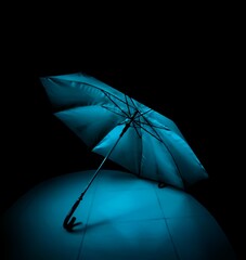 Low light, long exposure image of an umbrella