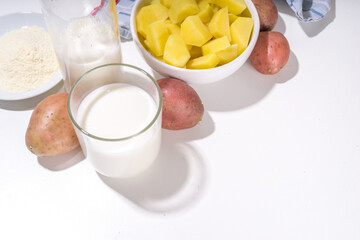 Alternative vegan potato milk, non-dairy creamy drink, with dried, raw and boiled potato 