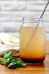 Tamarind juice with lemon in glass cup