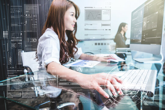 Closeup hand young asian business woman pressing the keyboard of computer with technology digital virtual screen for working in the modern Office over the teamwork background,people business concept