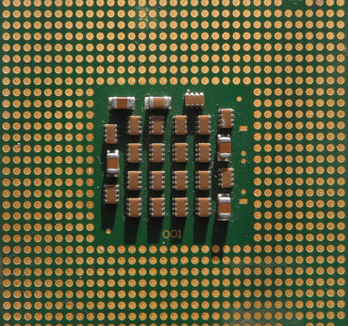 Old CPU socket 775 on a white background. Intel Celeron D 336 Prescott. Technological background