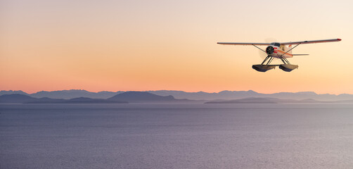 Seaplane Flying over the Pacific Ocean on the West Coast. Adventure Composite. 3D Rendering Airplane. Aerial Background Image from British Columbia near Vancouver, Canada.