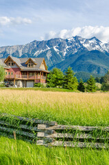 Luxury house over fantastic mountain view at sunny day in Vancouver, Canada.