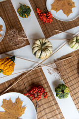 view from above on the dinner table setting decorated in the mood of the autumn festival
