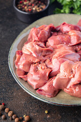 chicken liver raw offal pieces meal snack copy space food background rustic. top view