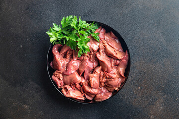 chicken liver raw offal pieces meal snack copy space food background rustic. top view