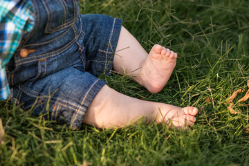 Kid Baby Toddler Toes Feet Sweet Cuddly Adorable Precious Overalls Sitting in Grass Child Children Alone 