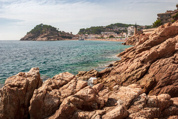 Tossa De Mar, Catalonia, Spain. A picturesque town with a fortress, with beautiful beaches and clean turquoise water in cozy bays near Barcelona. Famous tourist destination Costa Brava.