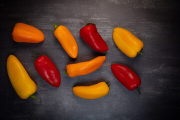 Assorted ripe multi-colored baby peppers, red, orange and yellow