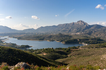 Fototapeta na wymiar Mountainous landscape with views of the Beniarres reservoir and Benicadell mountain in the background.