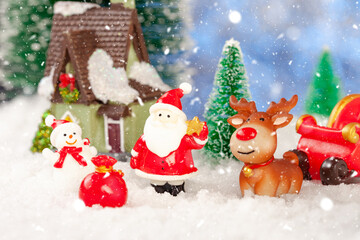 New Year greeting card with Santa Claus near the house. Concept