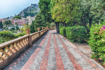 Walking in the beautiful public garden of Taormina, Sicily, Italy