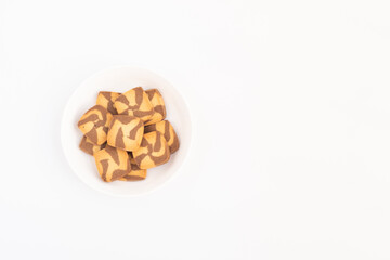 Square Shaped Chocolate Chip Brown Cookies Served In White Plate. Flay Overlay Top View On White Background With Copy Space For Custom Text