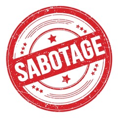SABOTAGE text on red round grungy stamp.