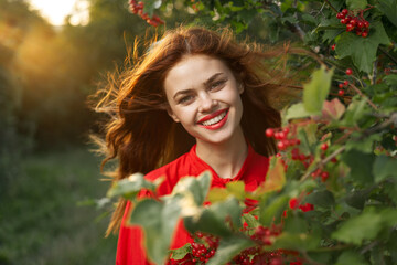 Naklejka premium smiling woman red lips posing nature fresh air summer