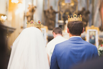 Fototapeta premium Wedding couple bide and groom get married in a church
