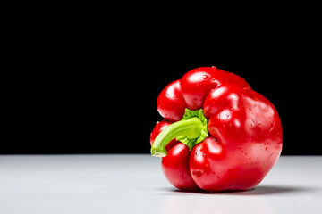 red bell pepper on black and white background