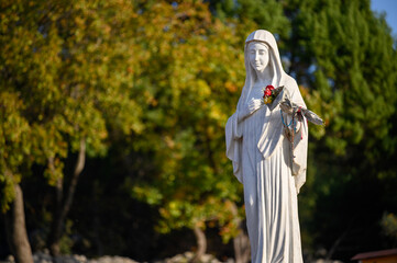 Statue of the Blessed Virgin Mary, the Queen of Peace, on Mount Podbrdo, the Apparition hill...