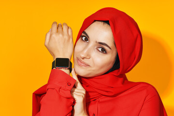 woman in red hijab joy leisure posing fashion yellow background