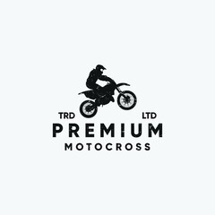 Premium motocross jumping silhouette vintage logo design