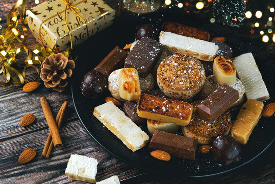 Nougat christmas sweet,mantecados and polvorones with christmas ornaments. Assortment of christmas sweets typical in Spain