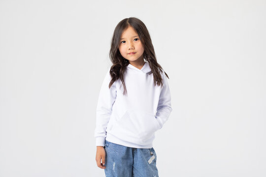 Cute asian girl in white blank hoodie. Mock-up.