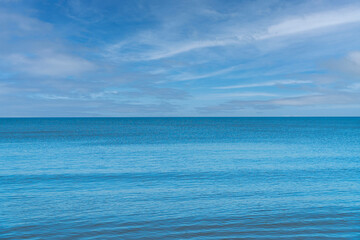 calm blue sea on an autumn sunny day close up