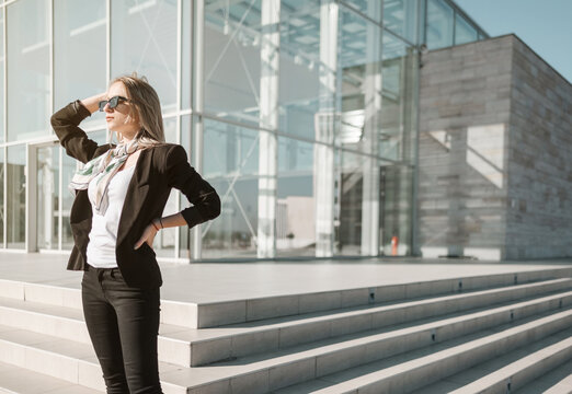 Pretty Young Business Woman Outside Office Building