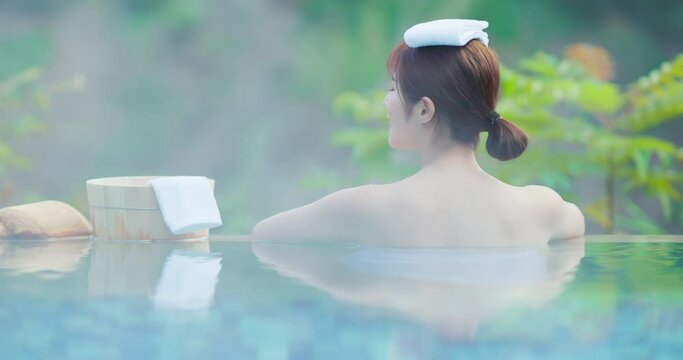 woman relax in hot spring