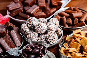 Assortment of delicious chocolate candies background. Chocolate candy isolated 