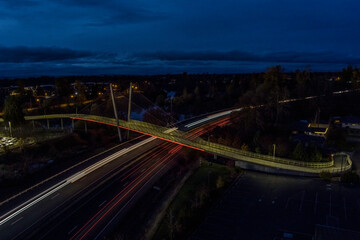 Fototapeta na wymiar Walking Bridge Over the Freeway