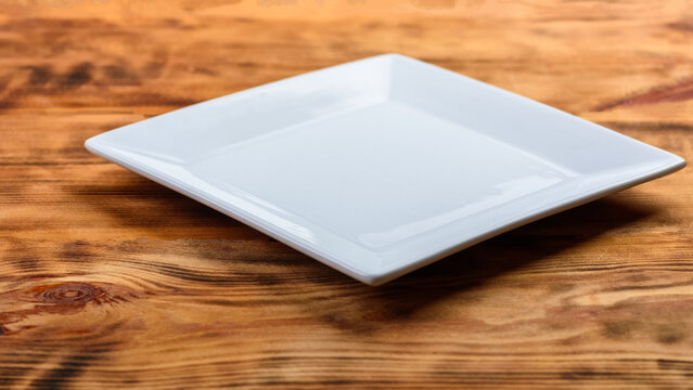 white square plate on natural tables
